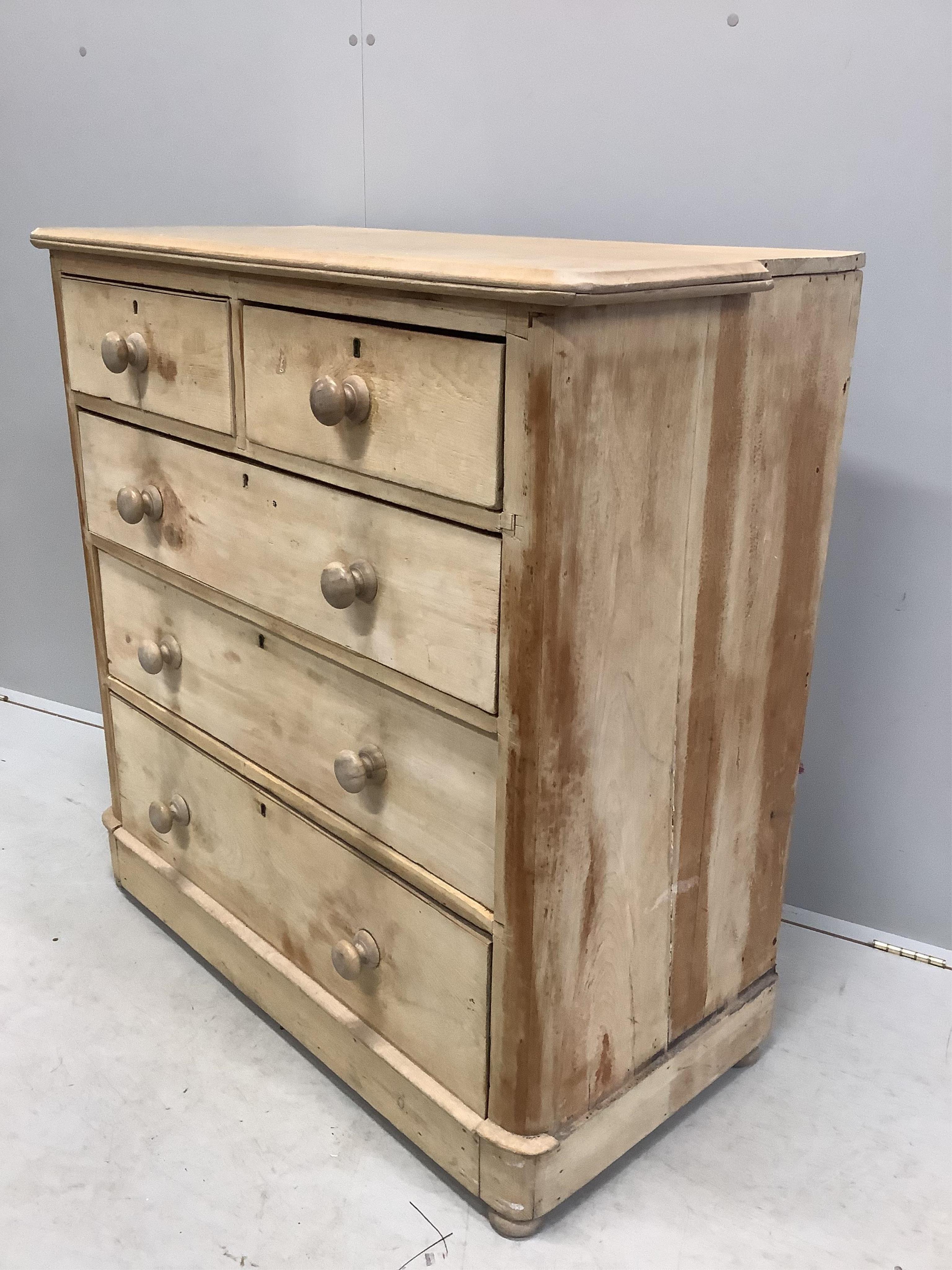 A Victorian pine chest, width 104cm, depth 49cm, height 105cm. Condition - fair, top cut to both sides